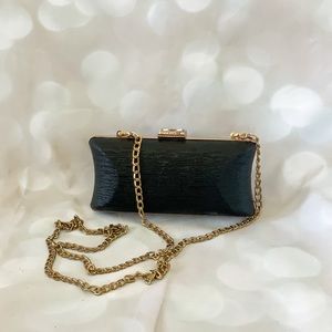 Black and gold chain clutch crossbody bag